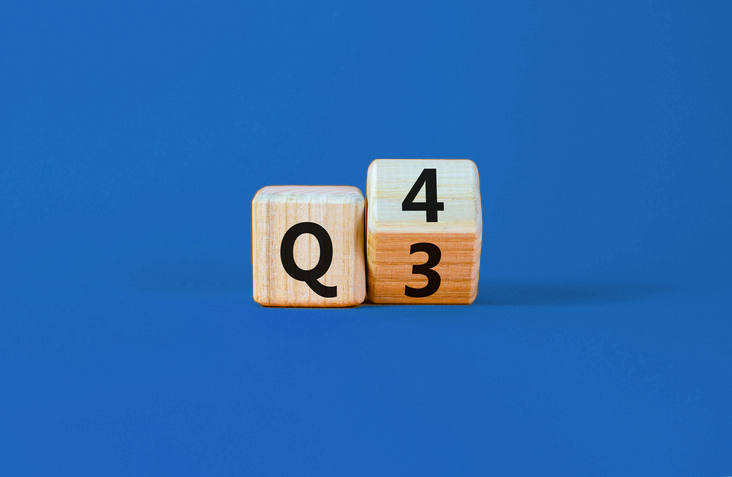 Wooden blocks show Q3 turning to Q4